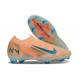 Crampon Nike Zoom Mercurial Vapor XVI Elite FG X MBAPPÉ Teinte Melon Neo Turq Igloo
